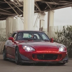 NexaNovo precision-fit carbon fiber front spoiler for Honda S2000 AP2 2004-2009.

