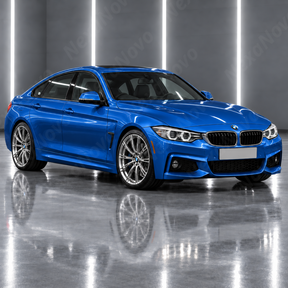 A bright blue BMW 4 Series Gran Coupe sedan shown from a three-quarter front angle in a modern studio setting with a reflective gray floor and vertical light panels.
