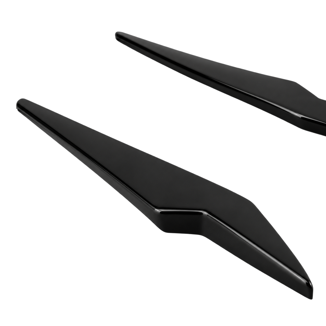 High-contrast visual transformation of the NexaNovo VTEN gloss black canards accenting a Brooklyn Grey 2026 BMW F74