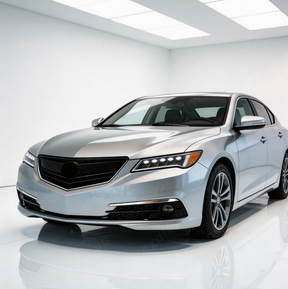 Acura TLX with new NexaNovo gloss black grille parked in a professional detailing studio