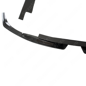 Underside of the TLX carbon front lip showing reinforced mounting points for high-speed stability