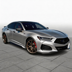 Direct side profile showing the integrated carbon fiber side skirt and rear wing flow for 2021-2025 TLX