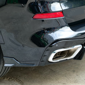 NexaNovo aggressive-fit gloss black rear corner splitters for 2023 BMW X5.
