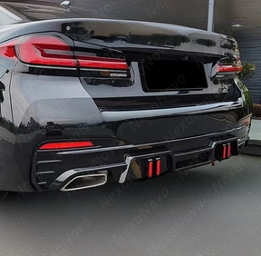 NexaNovo ultra-lightweight rear diffuser lips for 2022 BMW 530i G30.
