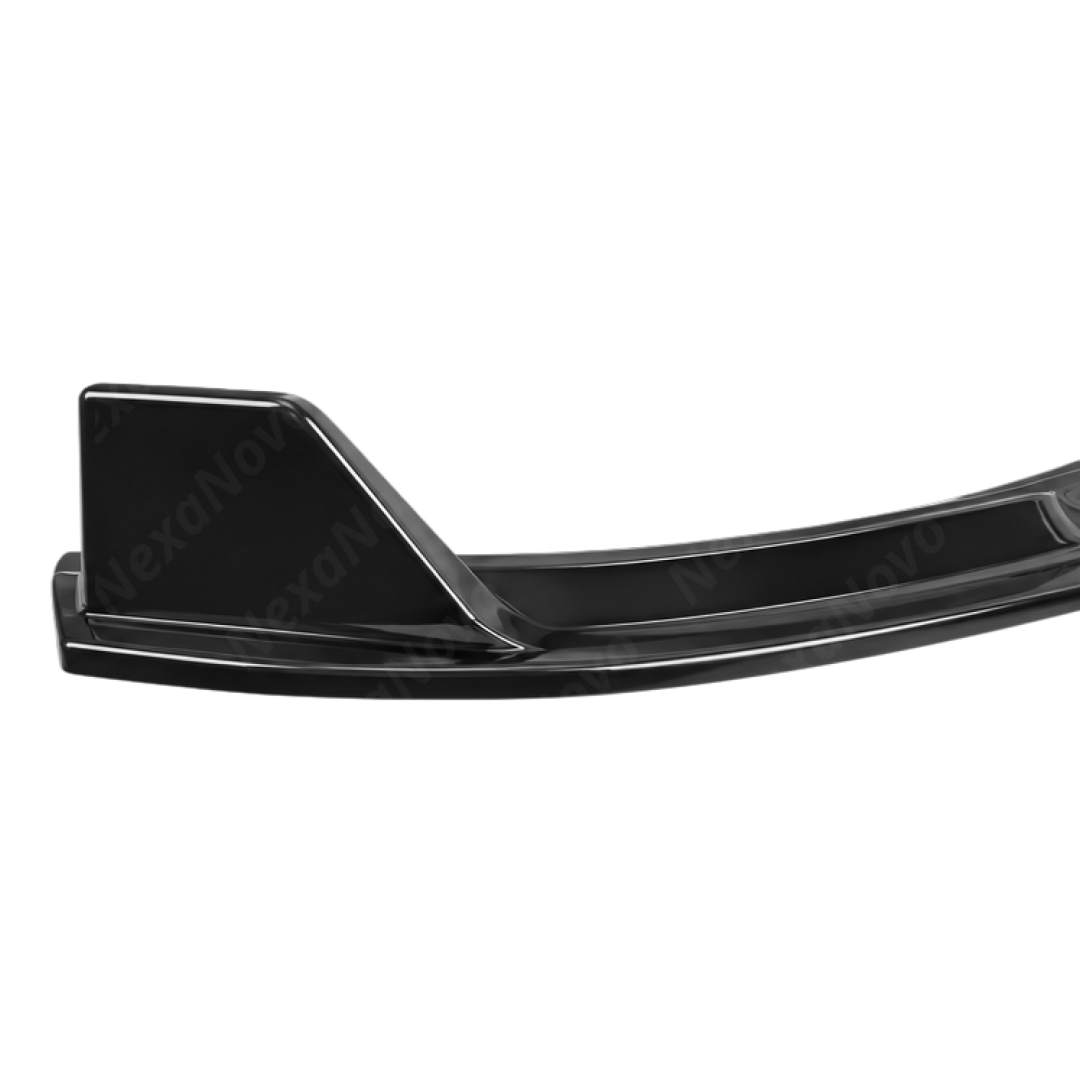 Profile view highlighting the subtle outer side winglet transition on the F74 front lip corner