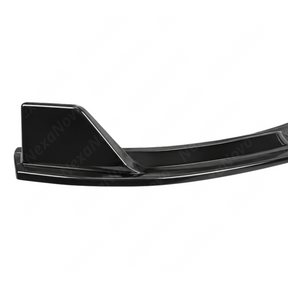 Profile view highlighting the subtle outer side winglet transition on the F74 front lip corner