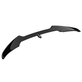 Close-up showing the precision fitment of the wing bases along the F74 trunk lid contours