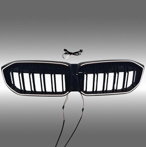 NexaNovo gloss black double-slat LED illuminated grille glowing on a 2023 BMW 3 Series G20