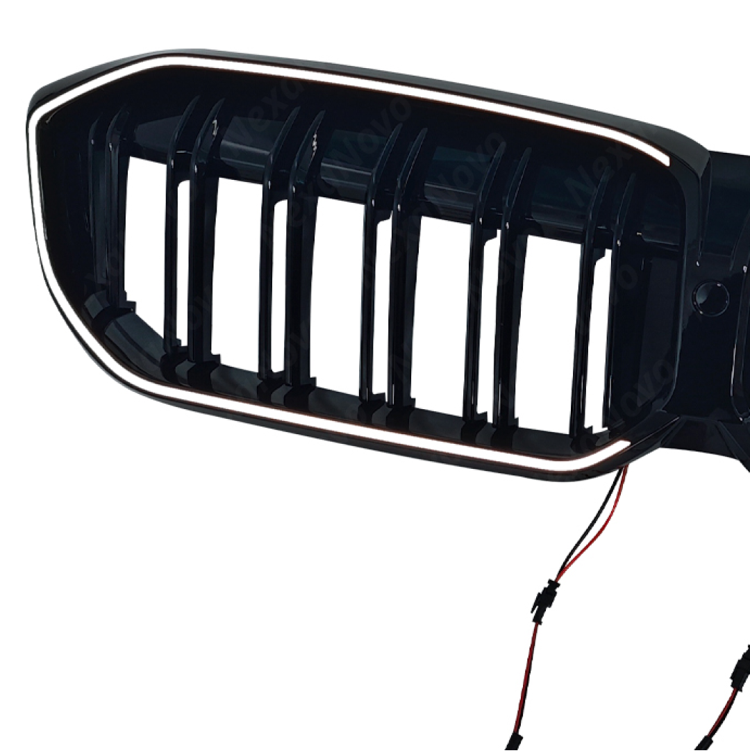 High-intensity LED perimeter glow of the NexaNovo illuminated double-slat grille at night