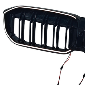 High-intensity LED perimeter glow of the NexaNovo illuminated double-slat grille at night