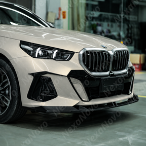 Direct front-facing view highlighting the aggressive lower air corner dive planes by NexaNovo on the G60 chassis