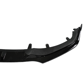 Detailed shot of the UV-resistant high-gloss clear coat on the NexaNovo 8 Series front lip