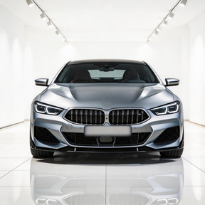 Direct front-facing view of the NexaNovo aerodynamic gloss black splitter for 2018-2026 BMW 8 Series