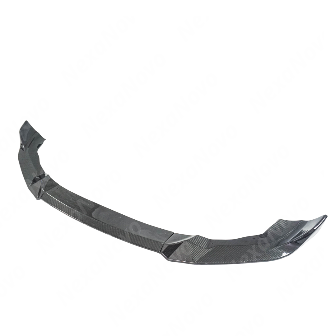 Uninstalled NexaNovo CS Style carbon fiber front bumper fascia with grilles