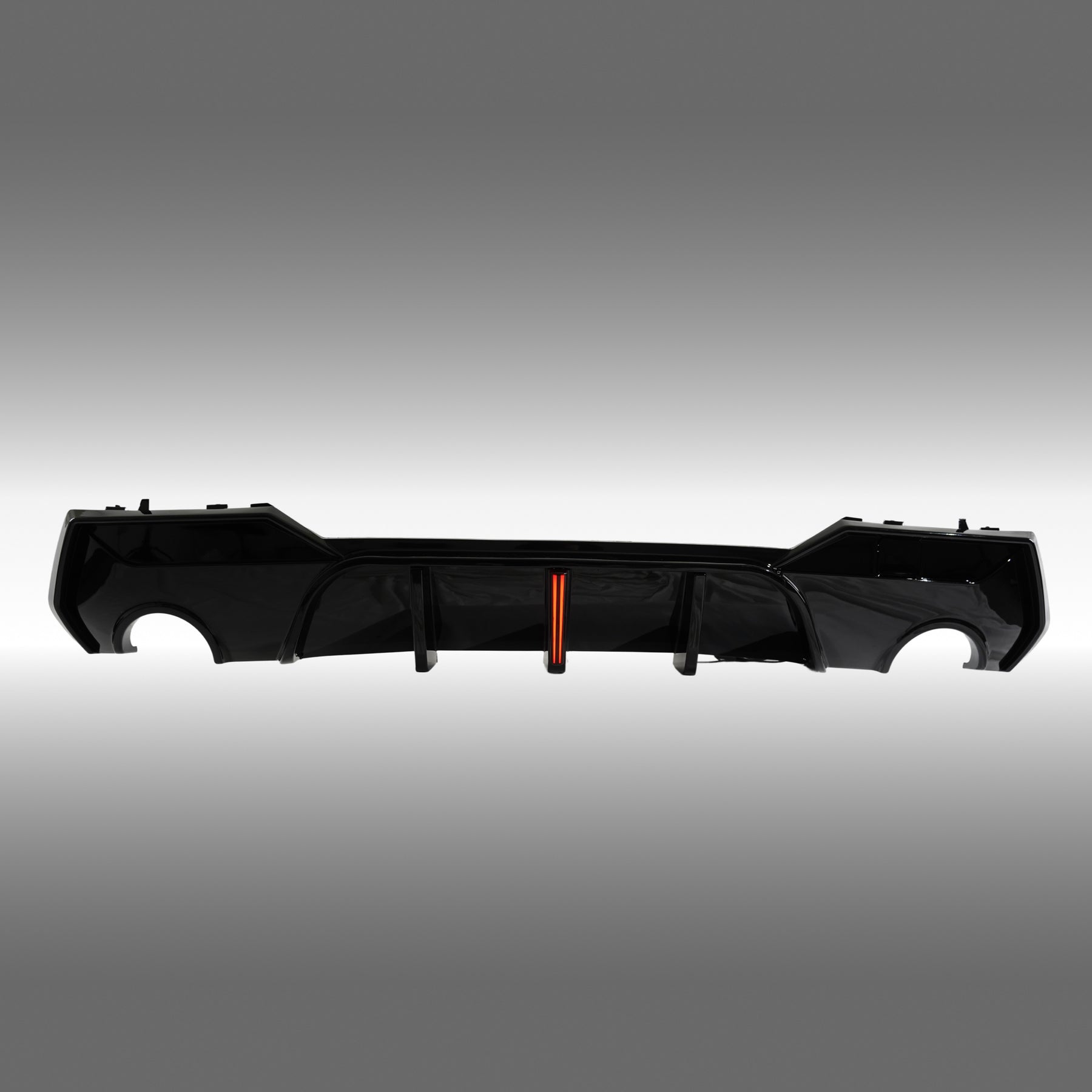 NexaNovo gloss black rear diffuser with integrated red LED brake light on a 2021 BMW G22 4 Series