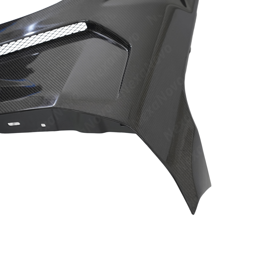 Detailed view of the hand-finished edges and clean lines of the NexaNovo G22 carbon trim