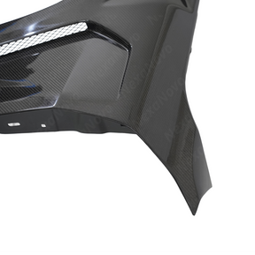 Detailed view of the hand-finished edges and clean lines of the NexaNovo G22 carbon trim