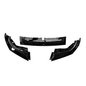 High-contrast styling of the NexaNovo deep gloss black front splitter mounted on an Alpine White BMW G26