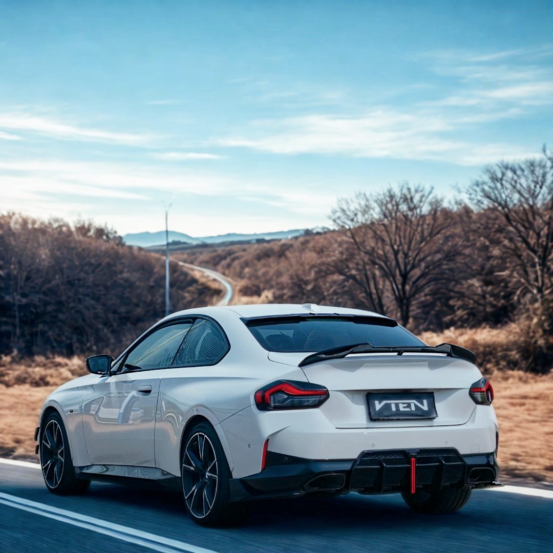Aerodynamic VTEN roof lip spoiler for improved G42 flow


