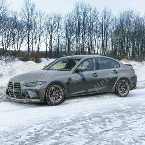 Angled front-to-rear view of G80 M3 showing NexaNovo front lip integration