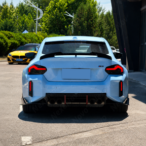 VTEN style gloss black wing spoiler by NexaNovo installed on a 2023 BMW M2 G87