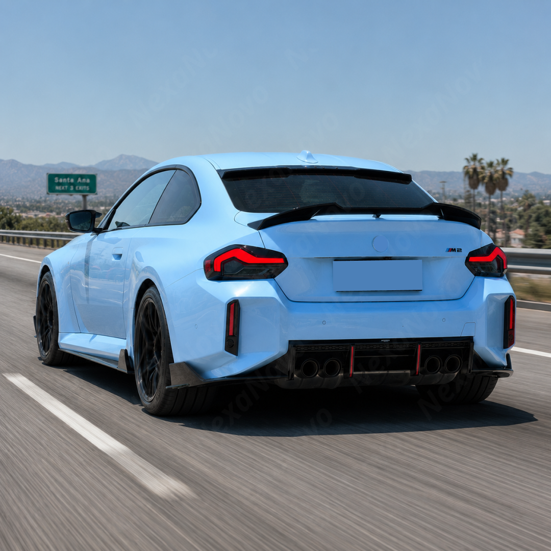 Direct rear view highlighting the aggressive GT-style profile of the NexaNovo VTEN wing on the G87 M2