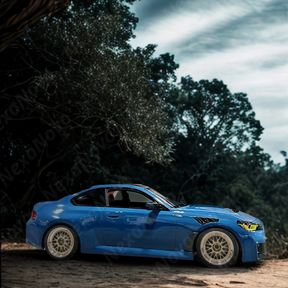 Full side view of a 2024 BMW M2 G87 with new NexaNovo N style carbon fiber fenders