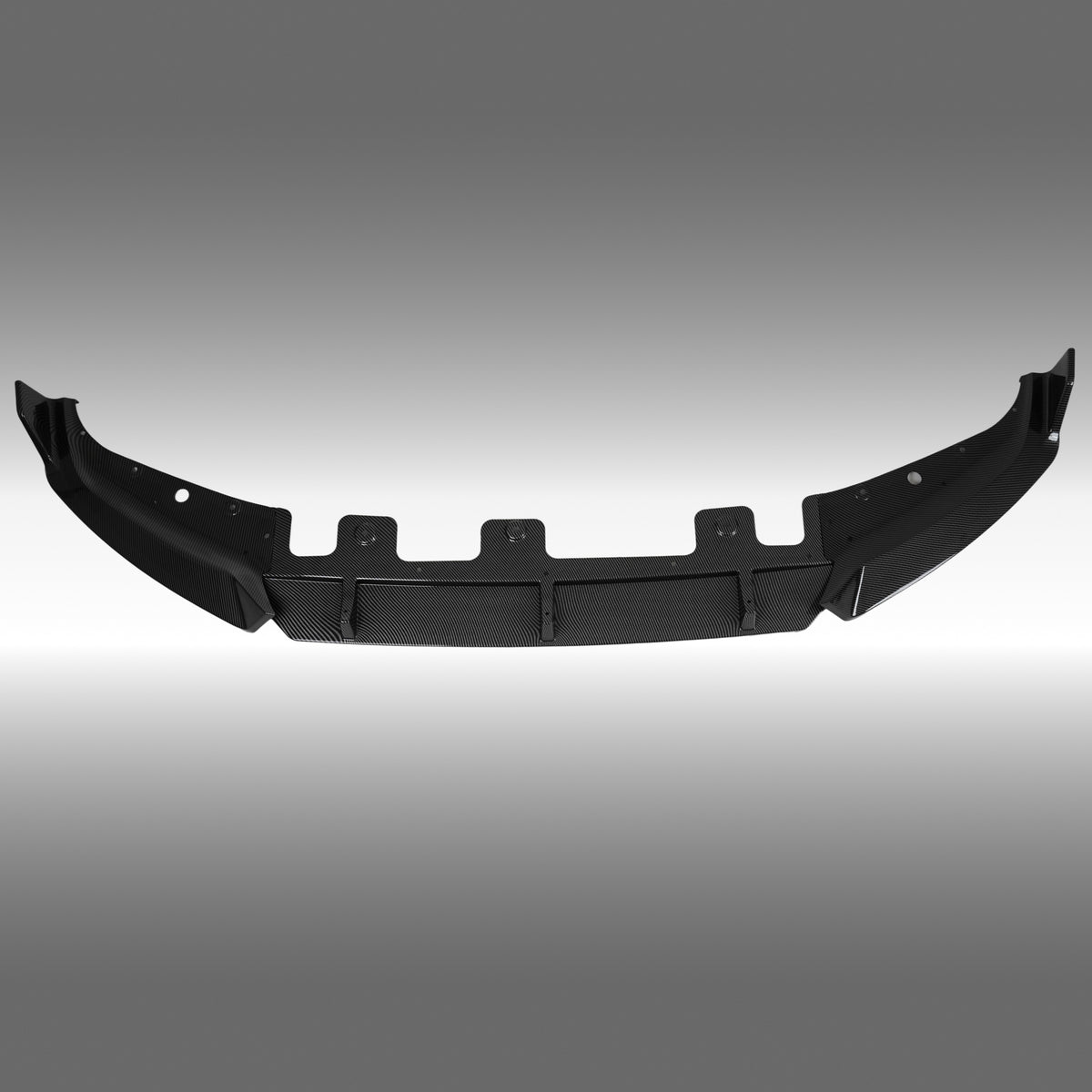 Standalone view of the uninstalled NexaNovo carbon fiber print front bumper lip for BMW X1 U11