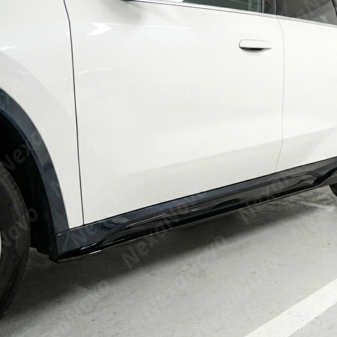 Direct side profile of the NexaNovo gloss black rocker panel extensions for 2023-2025 BMW X1