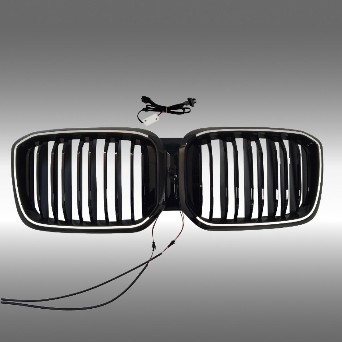 NexaNovo gloss black double-slat LED illuminated grille glowing on a 2019 BMW X3 G01