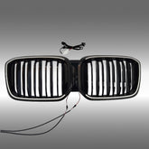 NexaNovo gloss black double-slat LED illuminated grille glowing on a 2019 BMW X3 G01
