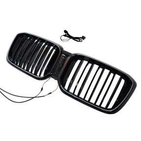 High-intensity LED perimeter glow of the NexaNovo illuminated double-slat grille at night