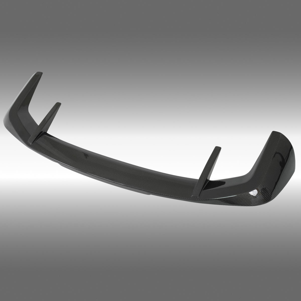 Close-up of the premium NexaNovo 3K twill double-sided real carbon fiber weave on the X5 spoiler