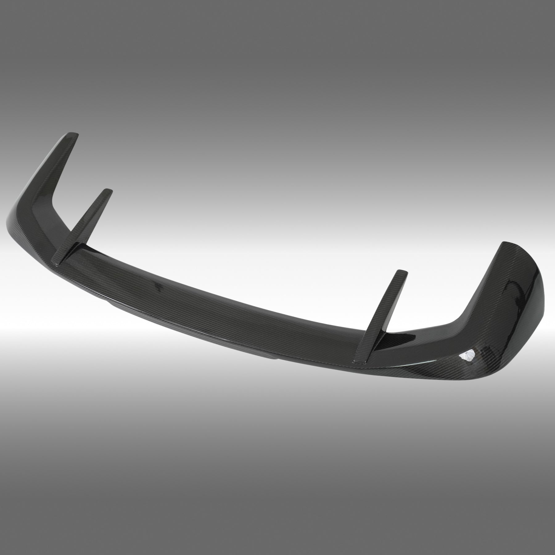 Close-up of the premium NexaNovo 3K twill double-sided real carbon fiber weave on the X5 spoiler