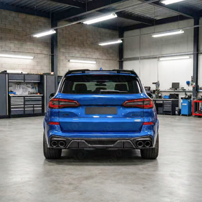 BMW X5 G05 with new NexaNovo double-sided real carbon fiber roof spoiler parked in a studio