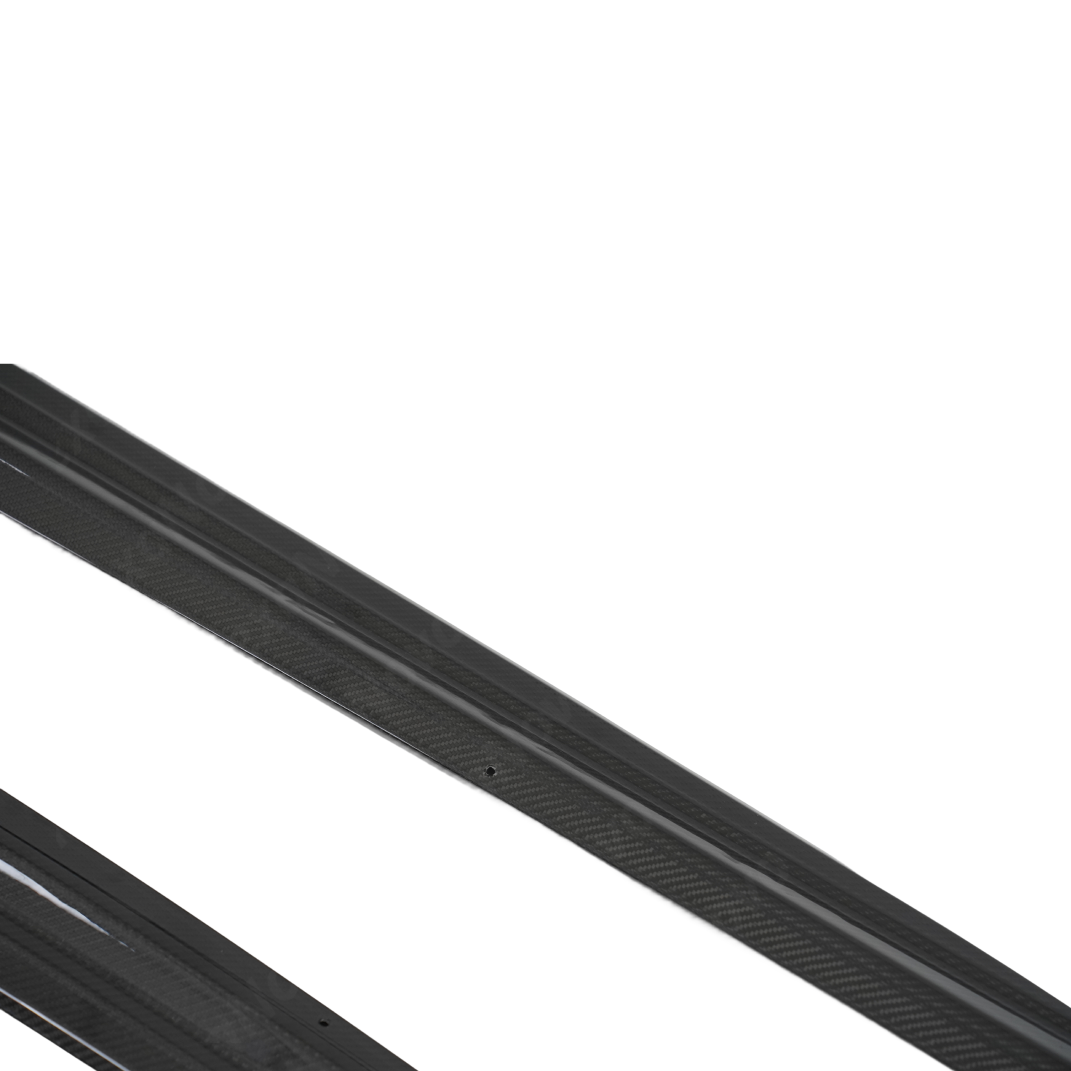 Professional studio photography highlighting the depth and texture of the NexaNovo carbon weave