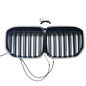 Angled side perspective showing the deep-set vertical slats of the NexaNovo X7 grille