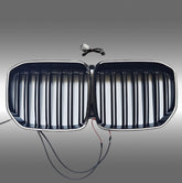 NexaNovo gloss black LED illuminated front kidney grille glowing on a 2019 BMW X7 G07