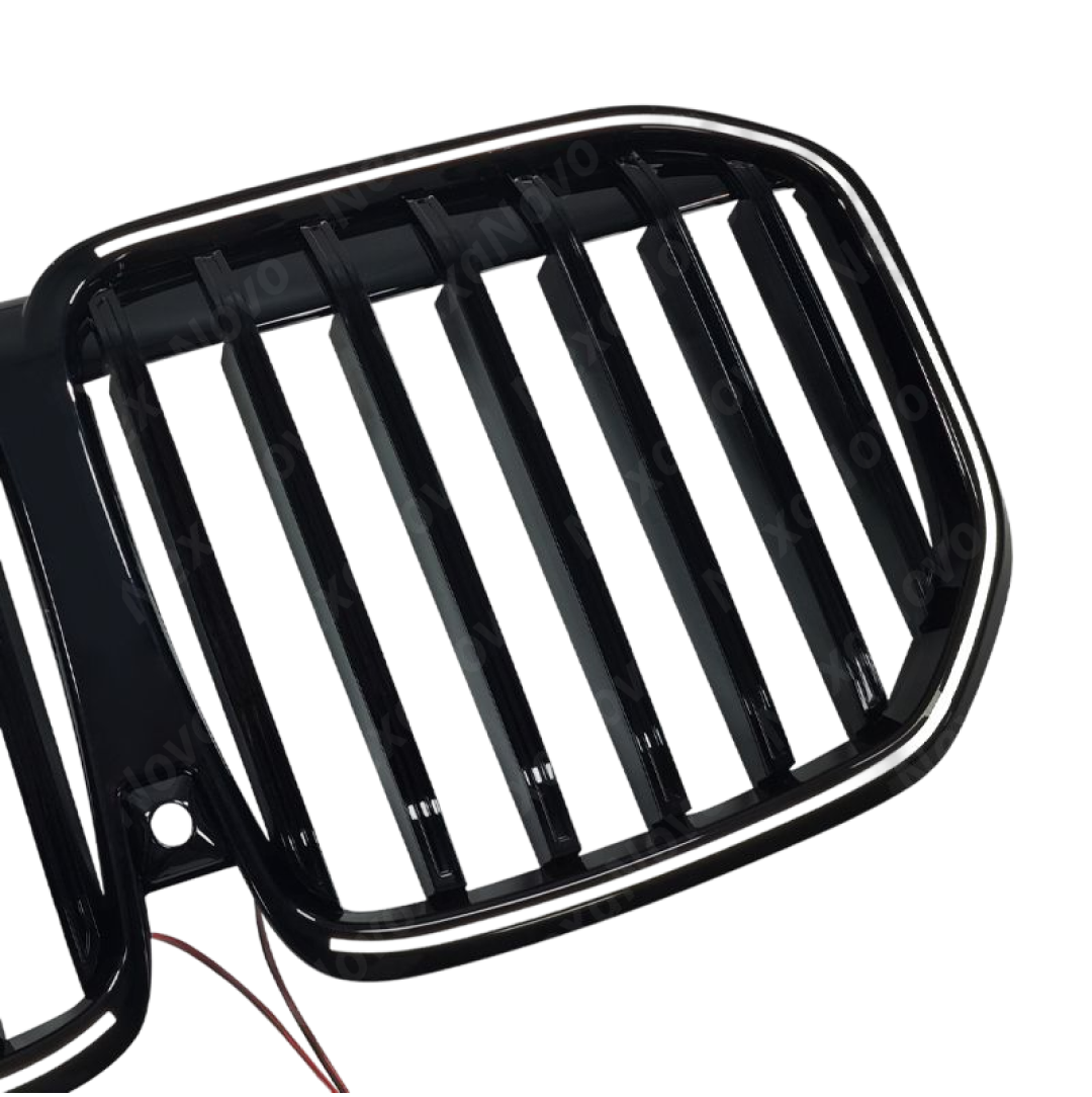 Detailed shot of the UV-resistant high-gloss black coating on the NexaNovo X7 kidney grille