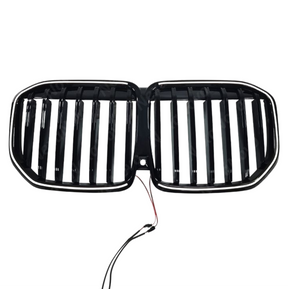 Professional studio photography highlighting the reflective gloss black surface of the NexaNovo grille