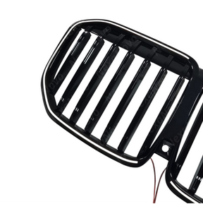 Standalone view of the uninstalled NexaNovo gloss black illuminated single grille for BMW X7