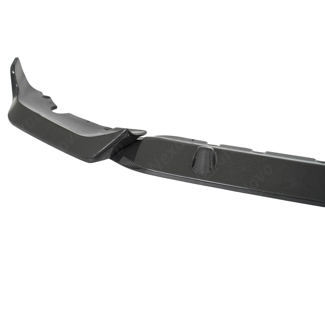 M-Performance inspired NexaNovo double real carbon fiber front splitter on a BMW X7 SAV