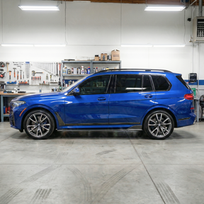 NexaNovo double-sided real carbon fiber side skirt rocker panels installed on a 2019 BMW X7