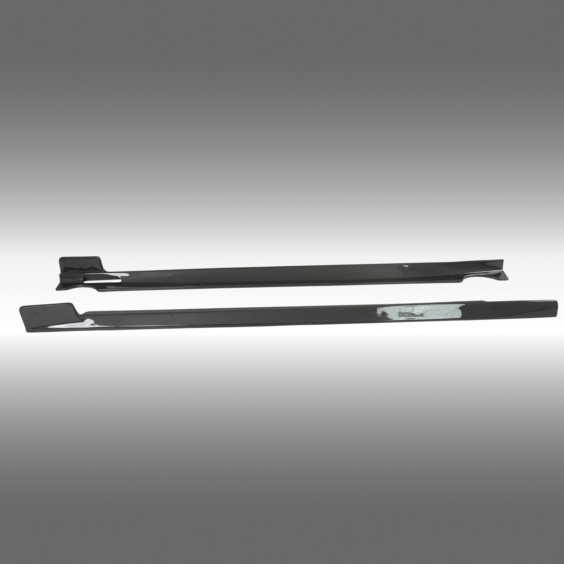 Close-up of the premium NexaNovo 3K twill double-sided real carbon fiber weave on the side skirts