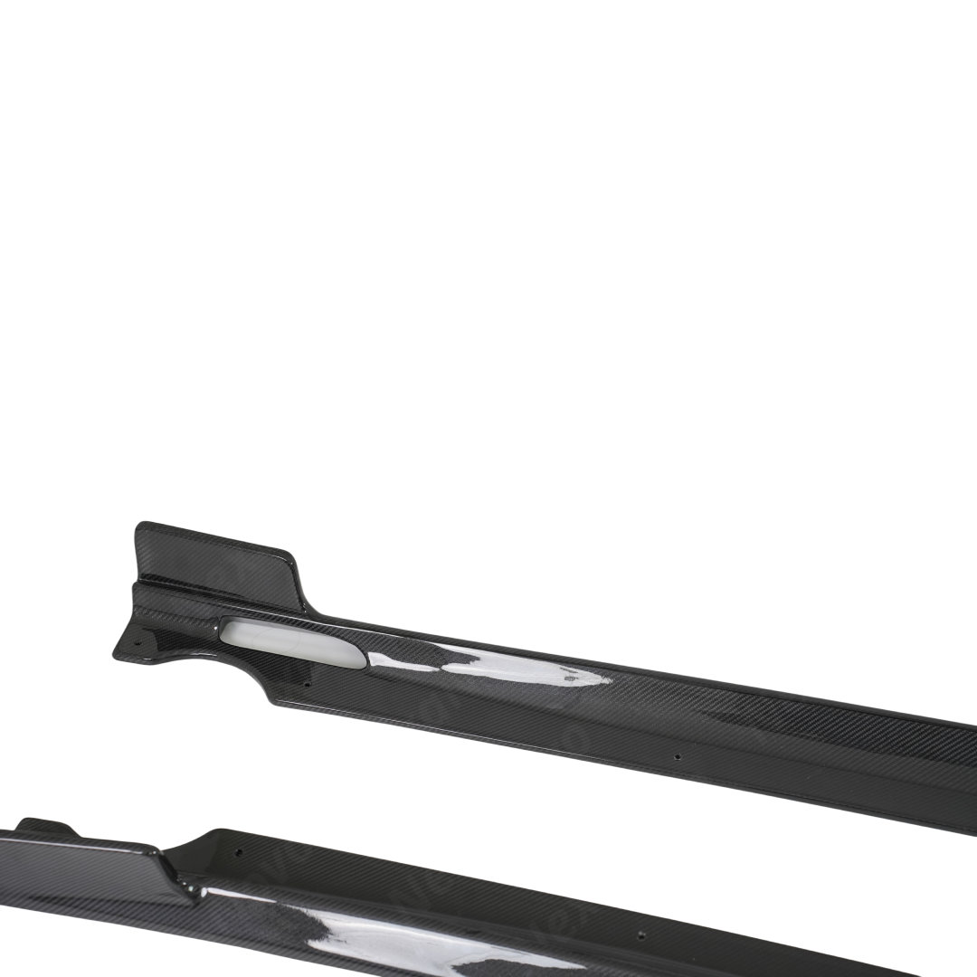 Standalone view of the uninstalled pair of NexaNovo double-sided real carbon fiber side skirts