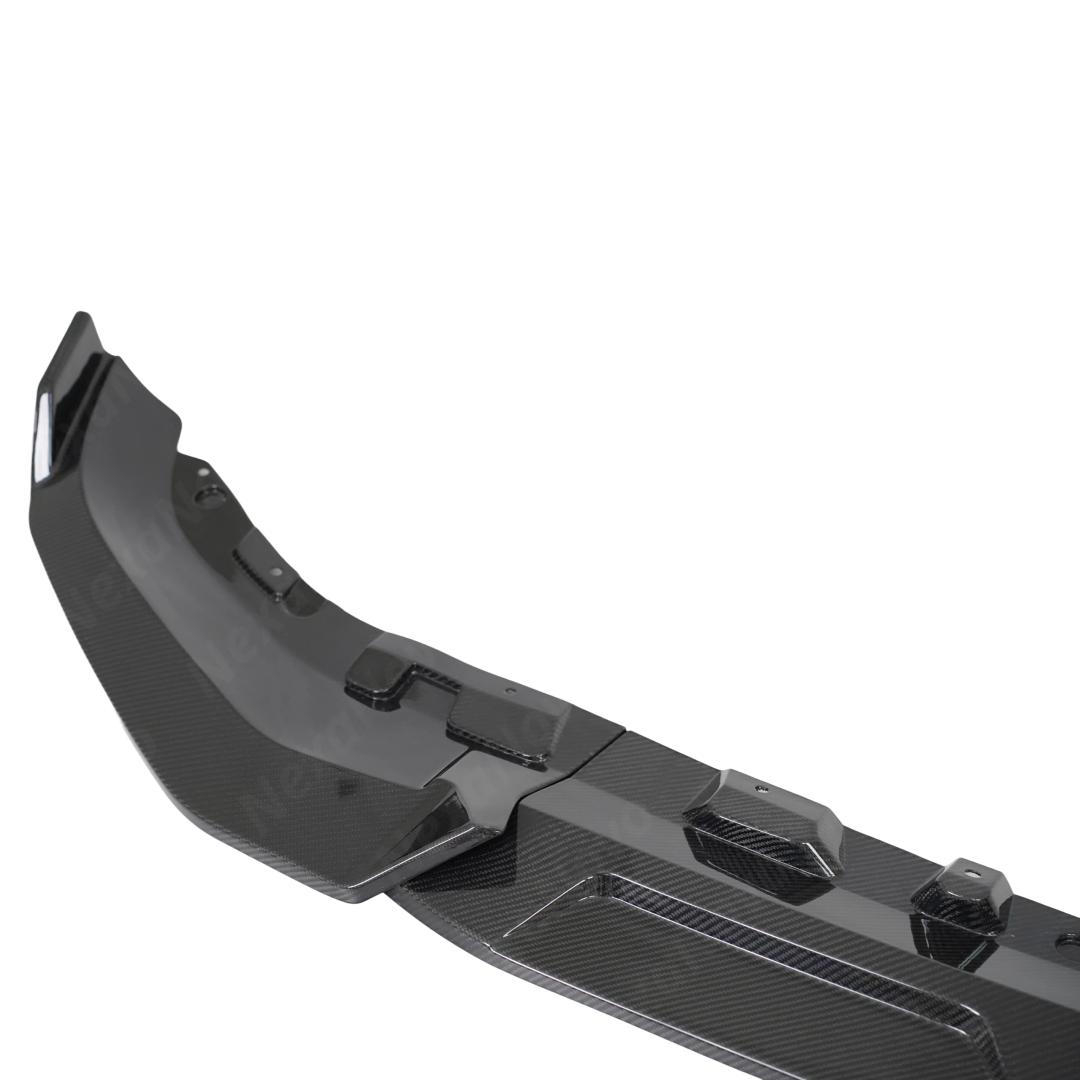 Detailed profile of the aerodynamic fins on the NexaNovo double-tier BMW X7 carbon front lip