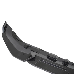 Detailed profile of the aerodynamic fins on the NexaNovo double-tier BMW X7 carbon front lip