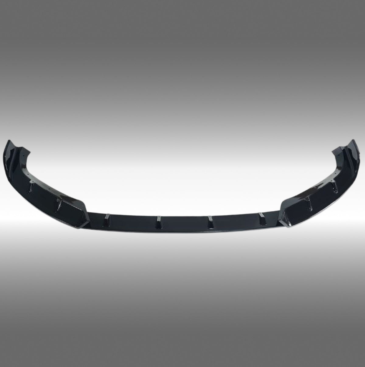 NexaNovo gloss black front bumper lip splitter installed on a 2023 BMW XM G09