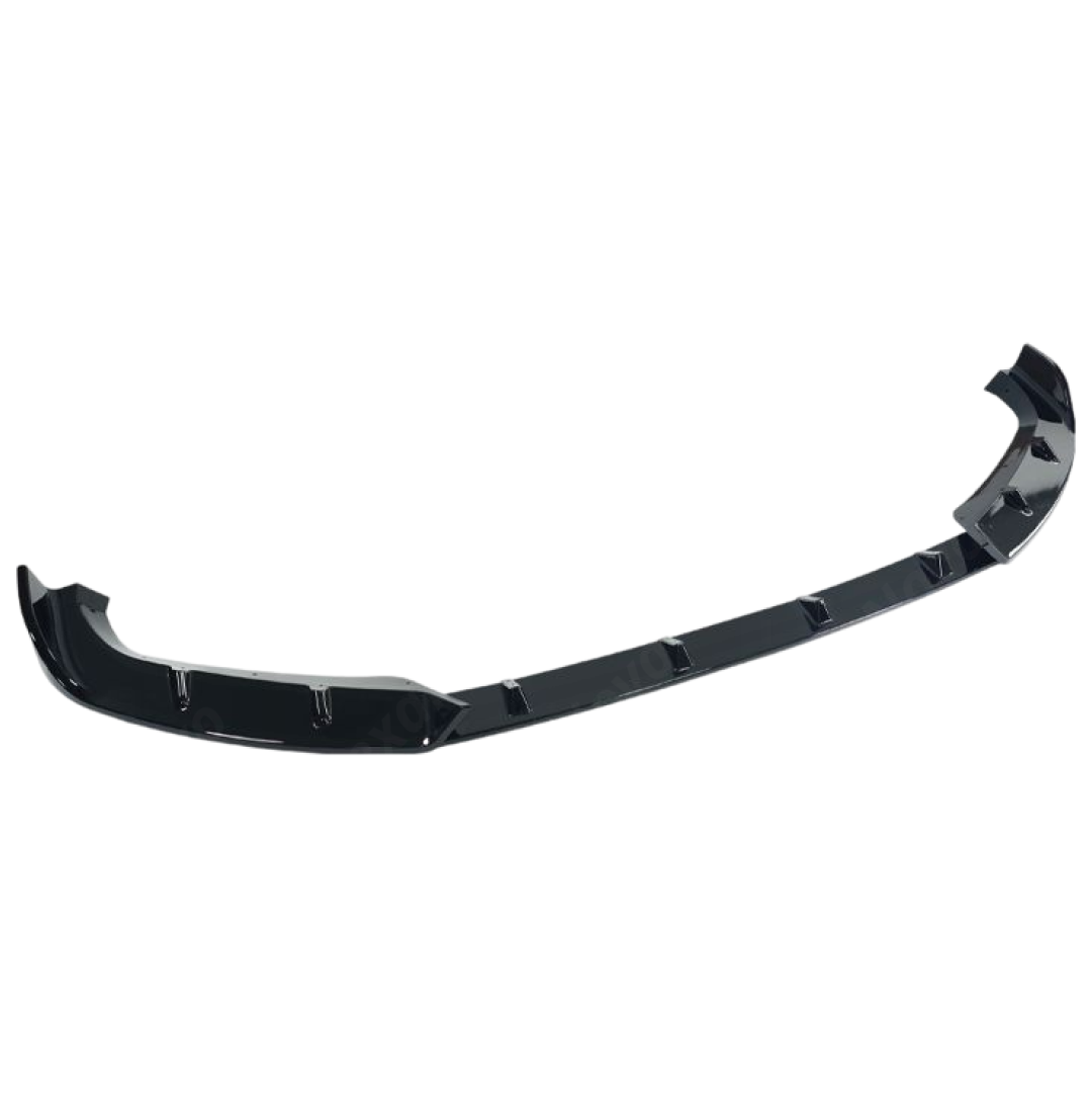 Close-up of the premium mirror-finish gloss black coating on the NexaNovo XM front splitter