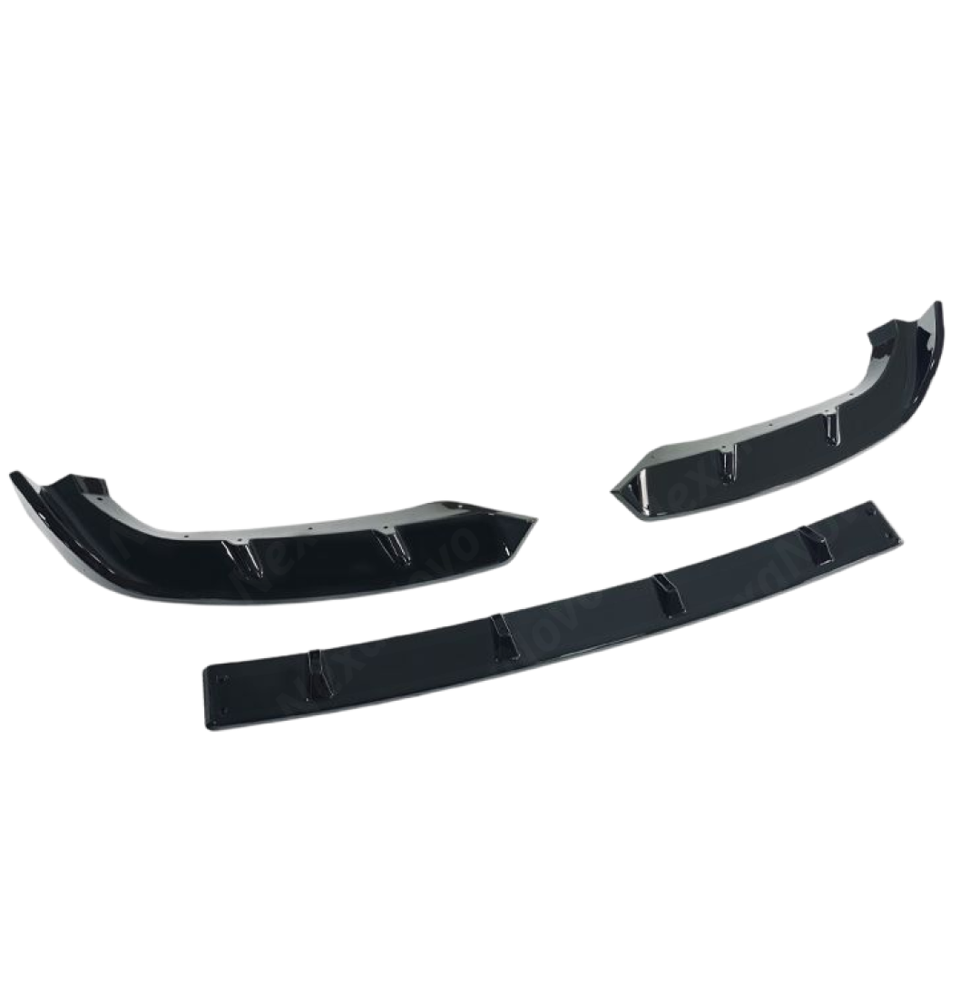 Standalone view of the uninstalled NexaNovo gloss black front bumper lip for BMW XM G09